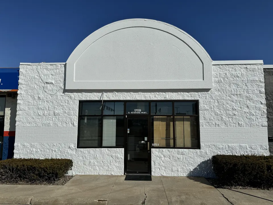 Commercial storefront repainted white